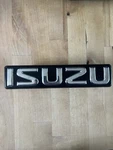 Isuzu Grille Emblem Badge Decal Logo Ascender Rodeo Pickup Oem 897096-933Y. Fixed Price $34.99.