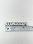 Mazda Emblem Badge Logo Nameplate Oem 855951781 !!pins!!. Fixed Price $6.30.