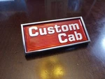 * Nos Oem Ford Custom Cab Emblem # EOTB10280C82A. Fixed Price $175.00.
