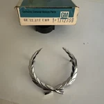 1982-96 Cadillac Fleetwood Roof Sail Panel Wreath Emblem Nos Gm 1712759, 7643400. Fixed Price $45.00.