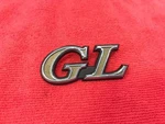 Datsun Cherry Gl F10 E10 Badge Emblem Nos GENUINE(78802 3205). Fixed Price $50.00.