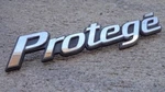 Mazda Protege Trunk Emblem Badge Decal Logo Symbol Oem Factory Genuine Stock. Fixed Price $17.53.