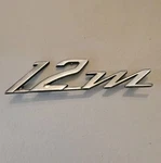 1959-1962 Ford Taunus "12M" Metal Fender Emblem As Removed P/n 11452404. Fixed Price $11.99.