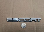 Ford Oem Escort Chrome Vintage 6.5" Emblem Badge Logo Nameplate F2CB-13B467-AA. Fixed Price $19.99.