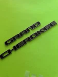17 21 Jeep Grand Cherokee Front Door Set Black Chrome Emblem 6863 8530AA. Fixed Price $19.50.