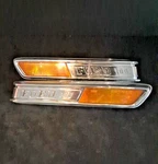 Vintage Pair Of 1968 Ford F-100 Fender Emblems With Organge Reflectors. Fixed Price $60.00.