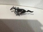 1973 Ford Mustang D3ZB-8216AA Grille Pony Emblem ,new,oem. Fixed Price $40.00.