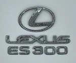 2002 - 2004 Lexus ES300 Oem Chrome Rear Trunk Lid Emblem Logo Badge Sign Symbol. Fixed Price $29.99.