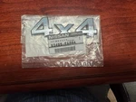 Genuine Nissan 2005+ Frontier Titan Xterra Chrome 4X4 Emblem New Oem 93495-EA80A. Fixed Price $25.00.