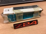 Nos 1986 1987 Chevrolet Chevy Cavalier Z24 Door Panel Emblem 20597750. Fixed Price $34.99.