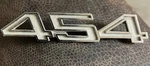 1969-1974 White & Chrome 454 Chevy Front Fender Emblem P39632 1/8 X. Fixed Price $17.50.