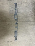 02 03 04 Nissan Frontier Rear Tail Gate Lid Emblem Logo Badge Symbol A20701. Fixed Price $30.00.