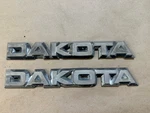 1987-1995 Dodge Dakota Emblems Pair 4357061 Plastic Oem 87-95. Fixed Price $47.49.