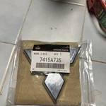 Genuine Mitsubishi Hatch Emblem 7415A735. Fixed Price $35.00.