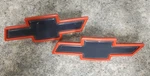 Set Of 2 - New Nos Genuine Gm Chevrolet Bowtie Emblems Black Red. Fixed Price $21.25.