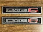 Two (2) 1965 Pontiac Lemans Tempest Fender Pmd Emblem 9780110 - 0044 A9. Fixed Price $50.00.