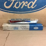 65 Custom Galaxie Nos Oem Ford C5AZ-5443504-A Trunk Emblem And Backing Plate. Fixed Price $250.00.