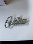 1970 Olds Cutlass Trunklid Emblem 8791878. Fixed Price $39.99.