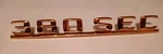 Mercedes 389SEC 380 Emblem Gold Plate Excellent 1268170915. Fixed Price $79.96.