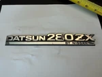 Datsun 280ZX By Nissan Rear Badge Emblem. Fixed Price $35.00.