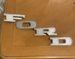 1968-1974 "ford" Hood Letter Set Metal Emblem, Pins, #D1UB-8A342AA-DA Abcd. Fixed Price $75.00.
