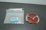 New Genuine 2016-2022 Mazda CX-9 TK78-51-731A Rear Chrome Logo Emblem. Fixed Price $75.00.