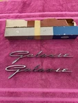Nos 1962 Ford Galaxie Fender Script Nameplate Ornament Pair C2AB-16098-A. Fixed Price $295.00.