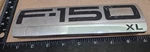 Ford F-150 Xl Emblem Circa '06 5L34 16B114 Pa 6163. Fixed Price $6.00.