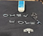 1969 Chevrolet Impala Caprice Nos Hood Letters Hardware. Fixed Price $150.00.