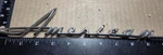 Rambler American Circa 1961 Front Fender Emblem 3458092 (X234). Fixed Price $100.00.