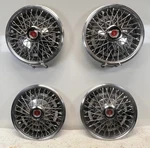 Set Of 4 Nos 1977 - 1980 Ford Mercury 13" Wire Spoke Wheel Covers Hubcaps. Fixed Price $149.99.