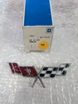 1977 Corvette Gas Door Emblem Gm Nos 379935. Fixed Price $90.00.