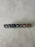 1999 2001 2002 2003 Mazda Protege Rear Trunk Nameplate Emblem B25D-51-710 Oem. Fixed Price $12.00.