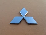 03 04 05 06 Mitsubishi Outlander Front Bumper Emblem Logo Badge Sign Used A47875. Fixed Price $40.00.
