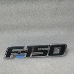 2009-2014 Ford F-150 Rear Tailgate Nameplate Emblem Chrome Black New Oem. Fixed Price $90.00.