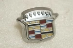 Cadillac Crest Trunklid Flip Keylock Cover Emblem N.o.s. 9833483 71 -76 /R1/. Fixed Price $135.99.