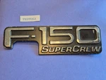 2001-2003 Ford Super Crew F-150 Side Fender Emblem YL34-8442528-AA. Fixed Price $15.00.