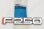 New Genuine Ford E7TZ-16720-B F-250 Chrome Plastic Factory Front Fender Emblem. Fixed Price $27.95.