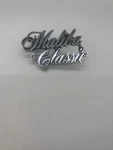 1976 77 Chevy Malibu Classic Fender Emblem Oem 345383 Script Nameplate Ornament. Fixed Price $24.99.