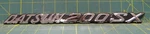 Datsun 200 Sx Emblem Nameplate Badge 76855N5800-1. Fixed Price $17.00.