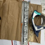 New Mercedes Benz W123 300CD Coupe Chrome Rear Trunk Script Badge 1238171415. Fixed Price $130.00.