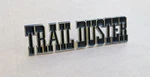 1974-81 Plymouth Trailduster Nameplate Emblem New. Fixed Price $75.00.
