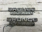 Vtg 78-79 Ford Bronco Ranger Side Fender Metal Emblems Set (2) D8TB-98023A48-DW. Fixed Price $40.00.