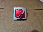 Saturn Sky Emblem Logo Rear Bumper Cenyer / Console 07-10 Oem. Fixed Price $35.00.