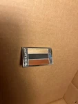 1973-1975 Chevrolet Camaro Front Emblem Used Orange Black Yellow 347572. Fixed Price $25.00.
