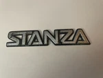 Nissan Stanza Emblem Ornament Badge Plate Y65A1 Plastic Oem. Fixed Price $12.00.
