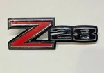 1970-74 Chevrolet Camaro Z28 Front Fender Emblem Gm Oem 1/2"X4 1/4" #3982067. Fixed Price $34.95.