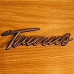 1996-1999 Ford Taurus Plastic Trunk Emblem Gray P/n F6DB-17E939-ABW. Fixed Price $8.99.
