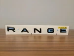 Genuine Land Rover 2022-UP Front "range" Badge LR154109. Fixed Price $90.08.