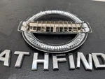 2011 Nissan Pathfinder Rear Emblem #A18603. Fixed Price $19.99.
